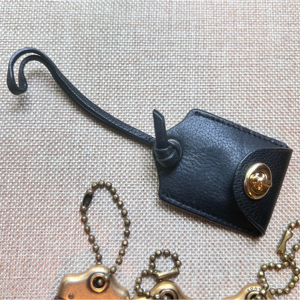 Coach clochette black leather and gold hardware